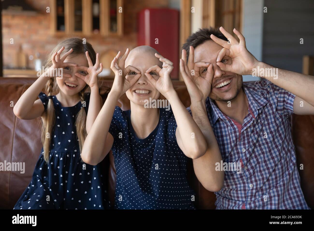 Ritratto di famiglia con il cancro ammalato mamma Foto Stock