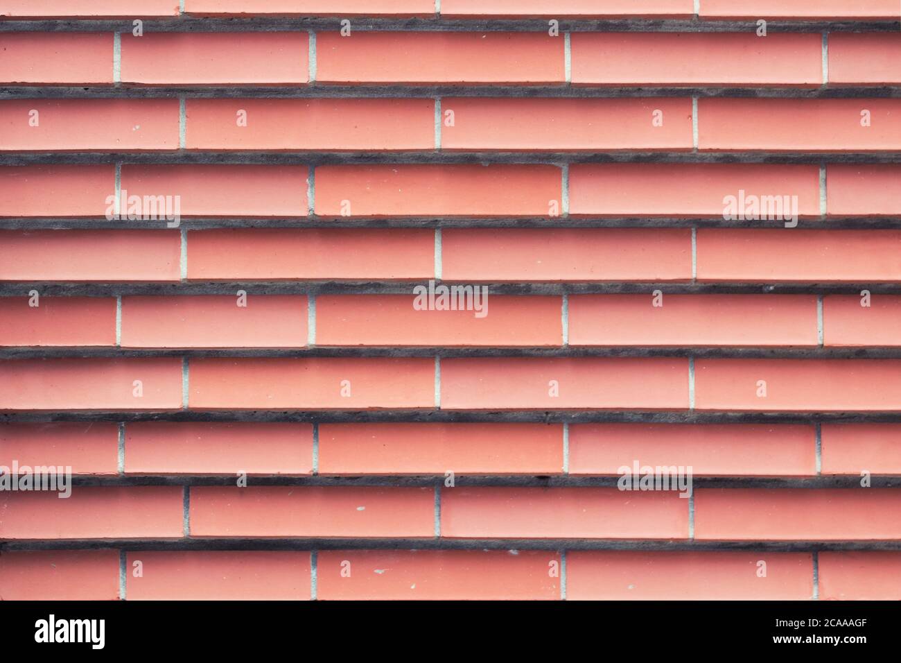 Muro di mattoni astratti. Muro di mattoni closeup modello. Foto Stock