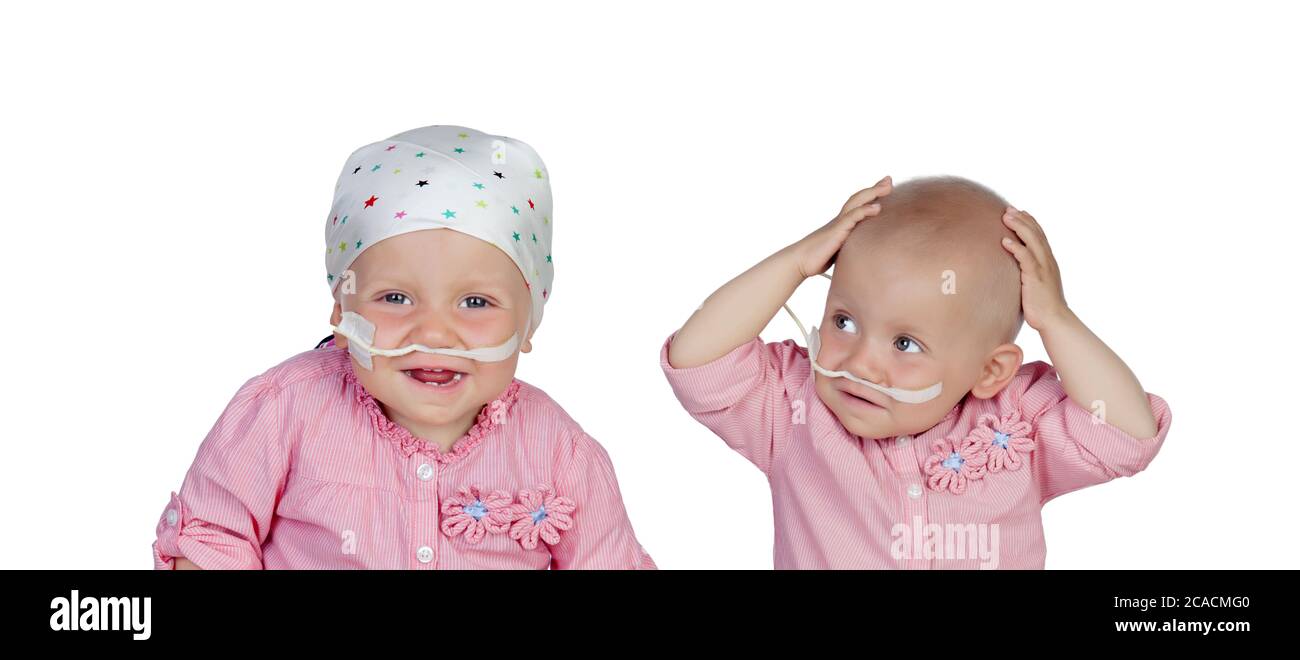 Adorable baby con un velo battendo la malattia Foto Stock
