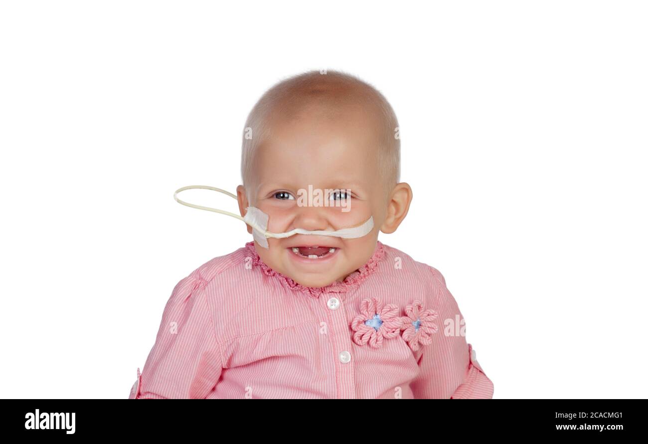 Adorable baby con un velo battendo la malattia Foto Stock