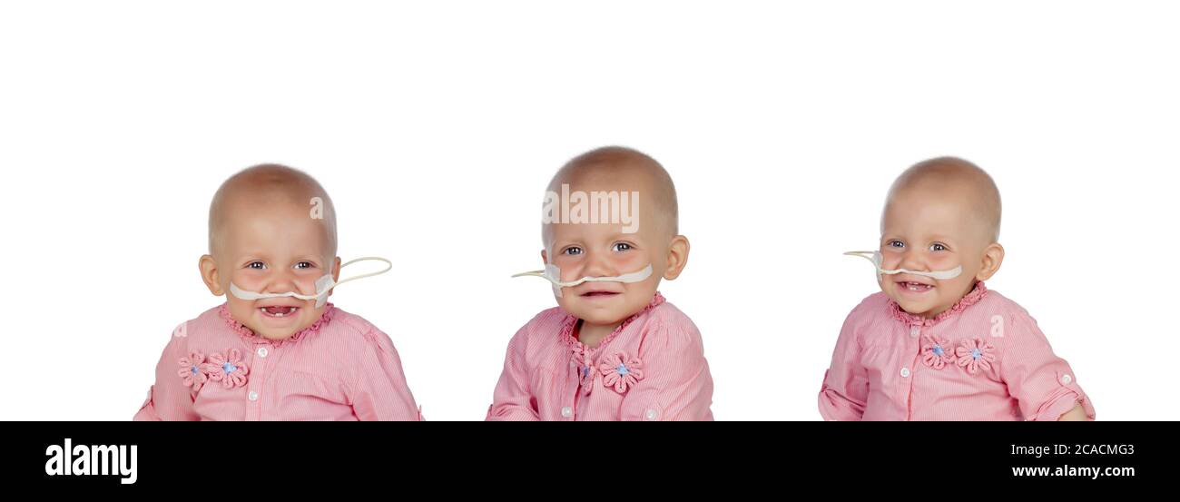 Adorable baby con un velo battendo la malattia Foto Stock