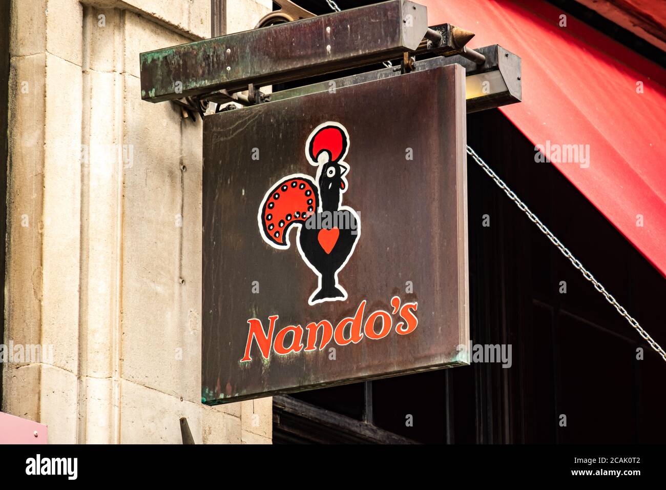 Segnaletica per i ristoranti di Londra- Nando's nel West End di Londra Foto Stock