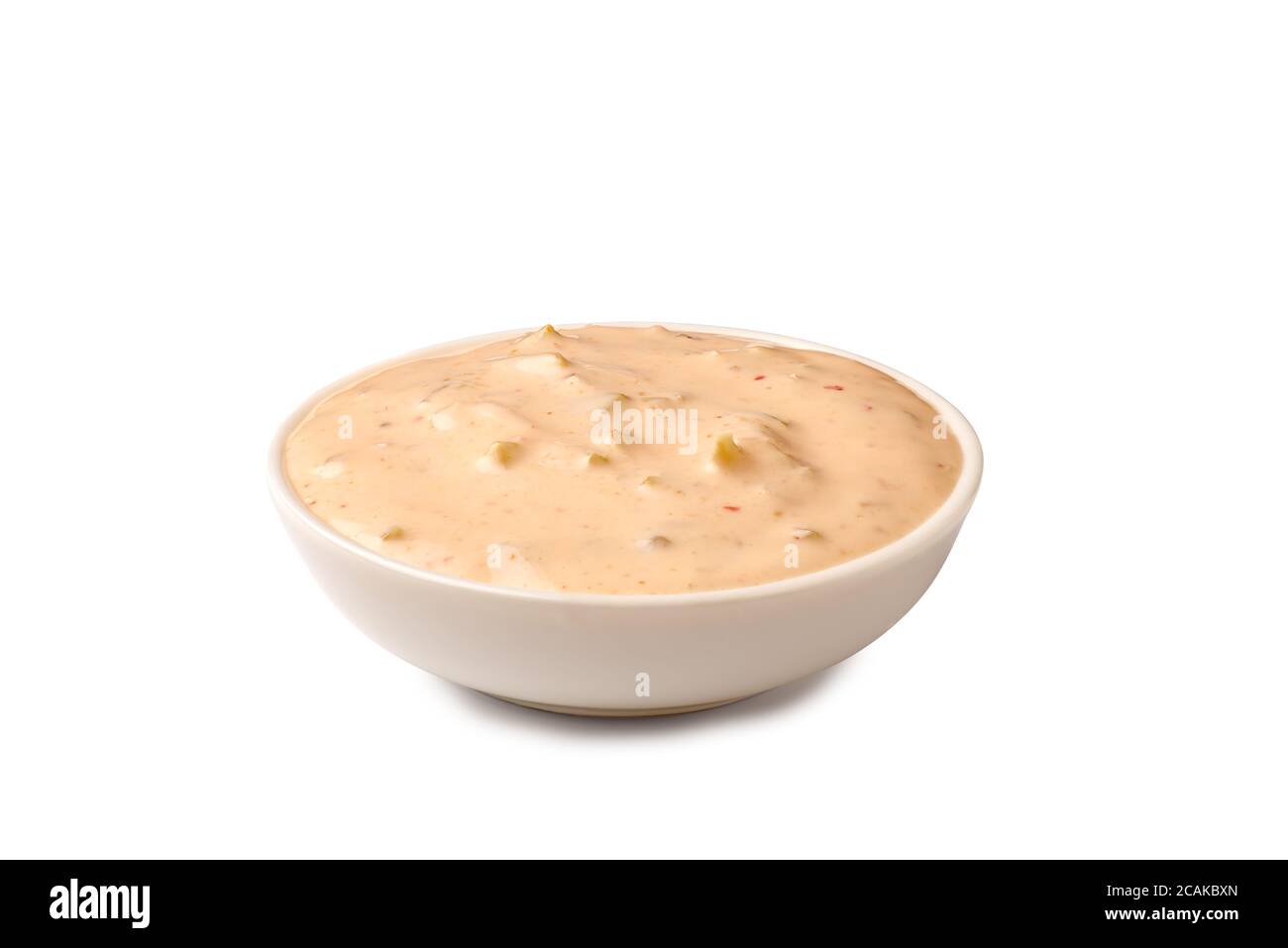 Ciotola di salsa tartara su bianco Foto Stock