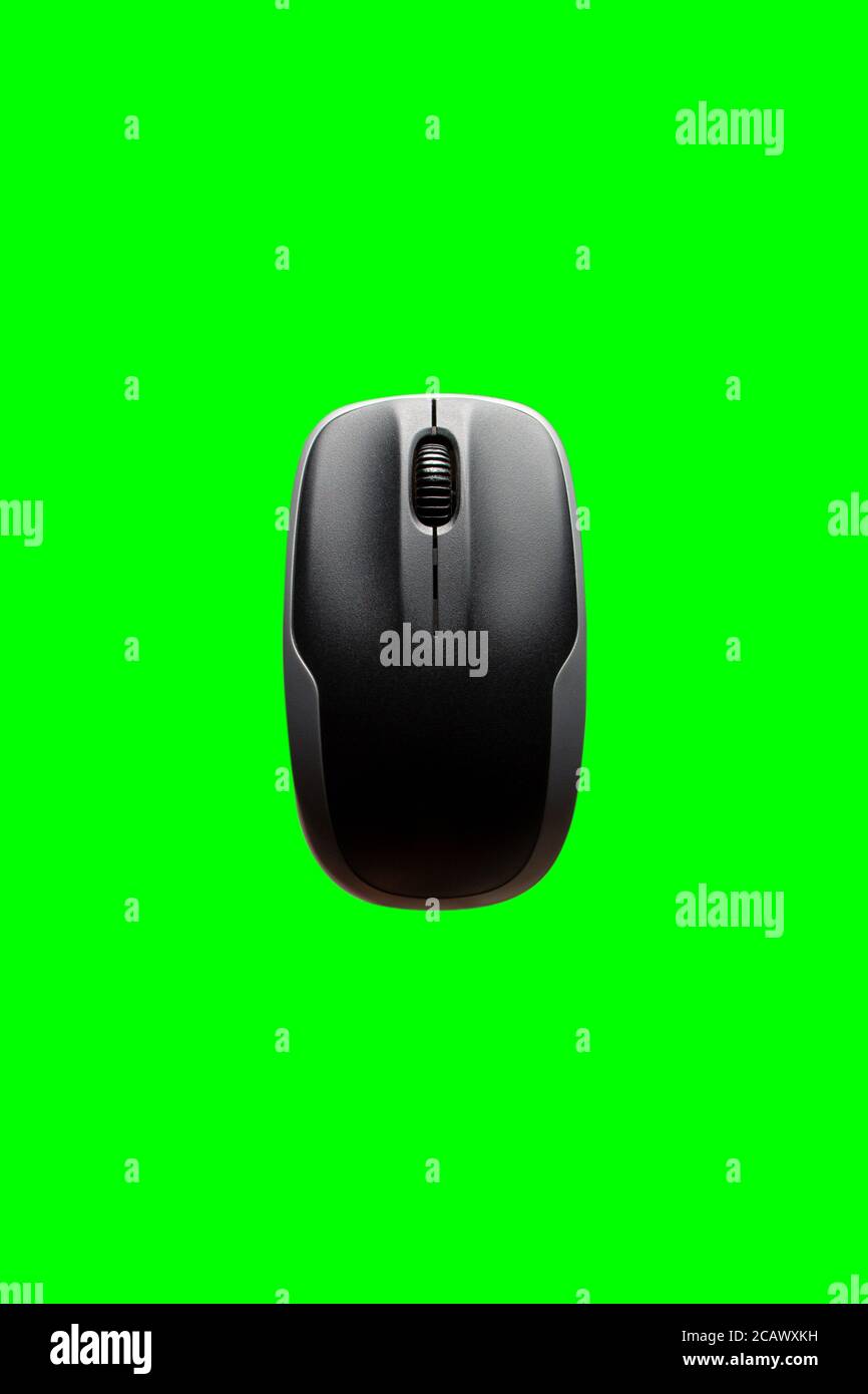 mouse del computer isolato su sfondo verde. Foto Stock
