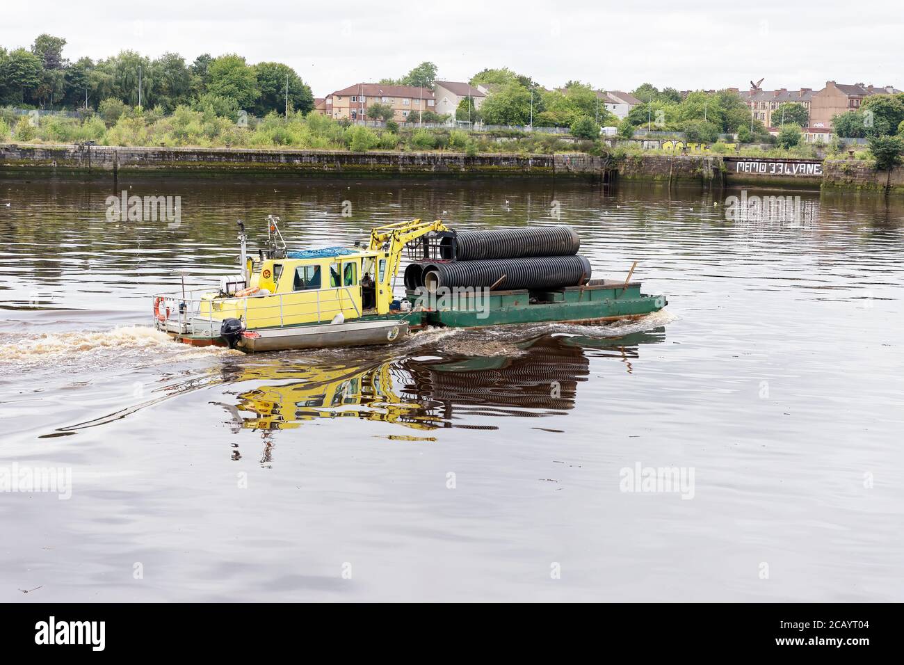 Il Saint Mungo, la 'Strega dell'acqua'. Rimuove i detriti portati sul fiume Clyde. Foto Stock