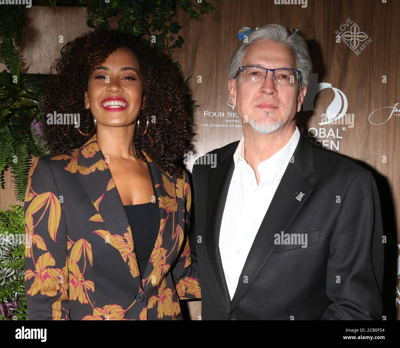 LOS ANGELES - FEBBRAIO 20: Danni Washington, Michael Cain al Global Green 2019 Pre-Oscar Gala al Four Seasons Hotel il 20 Febbraio 2019 a Beverly Hills, CA Foto Stock