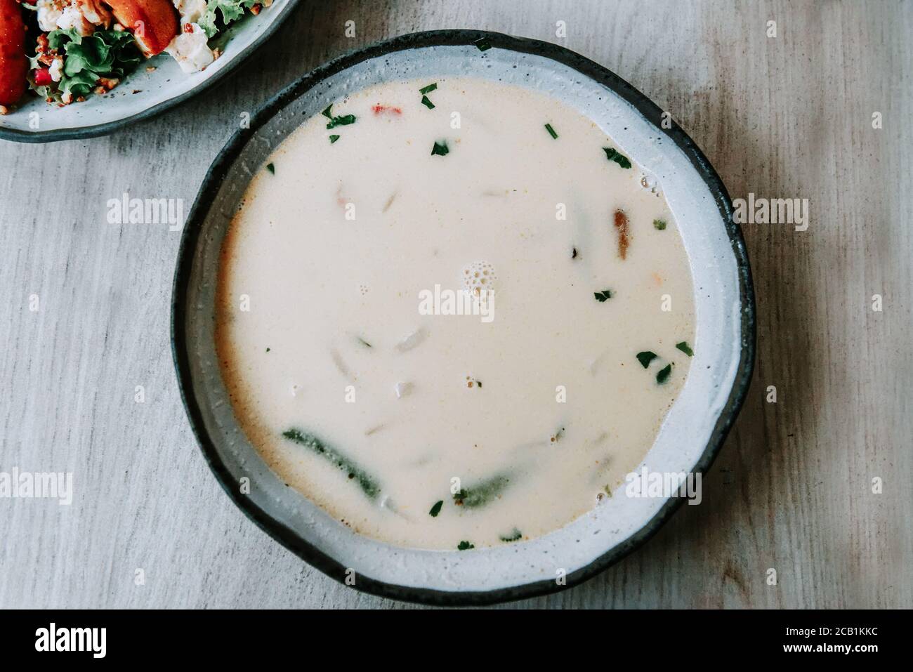 Zuppa tailandese con latte di cocco Foto Stock