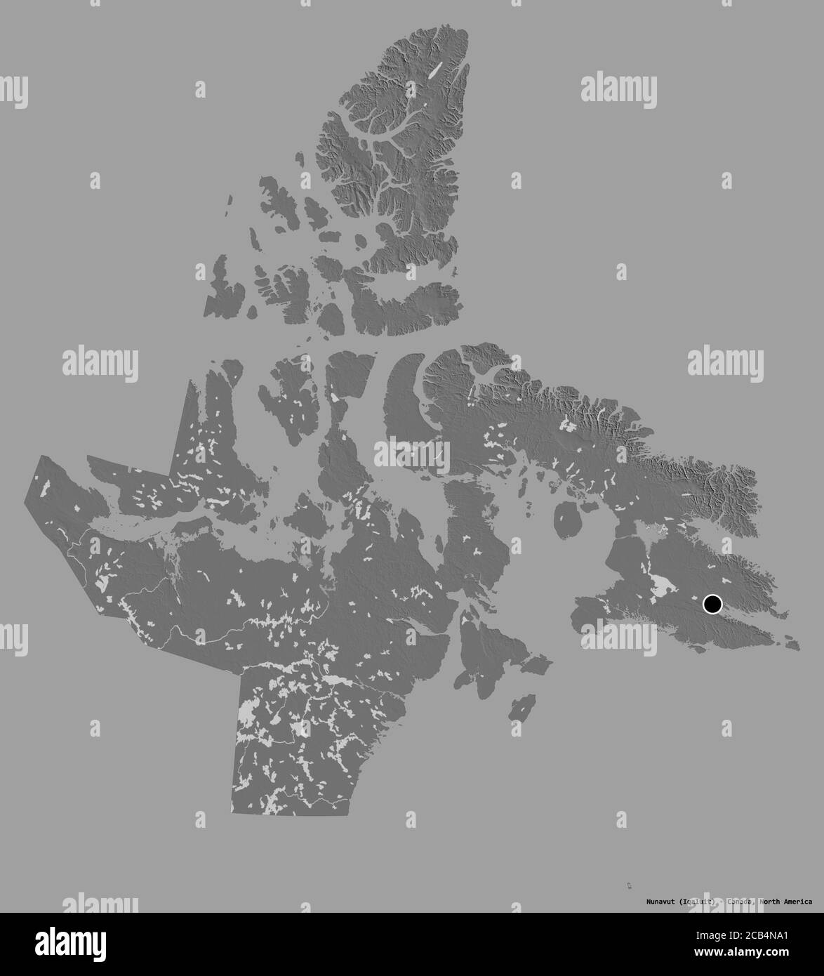 Forma di Nunavut, territorio del Canada, con la sua capitale isolata su uno sfondo di colore pieno. Mappa elevazione bilivello. Rendering 3D Foto Stock