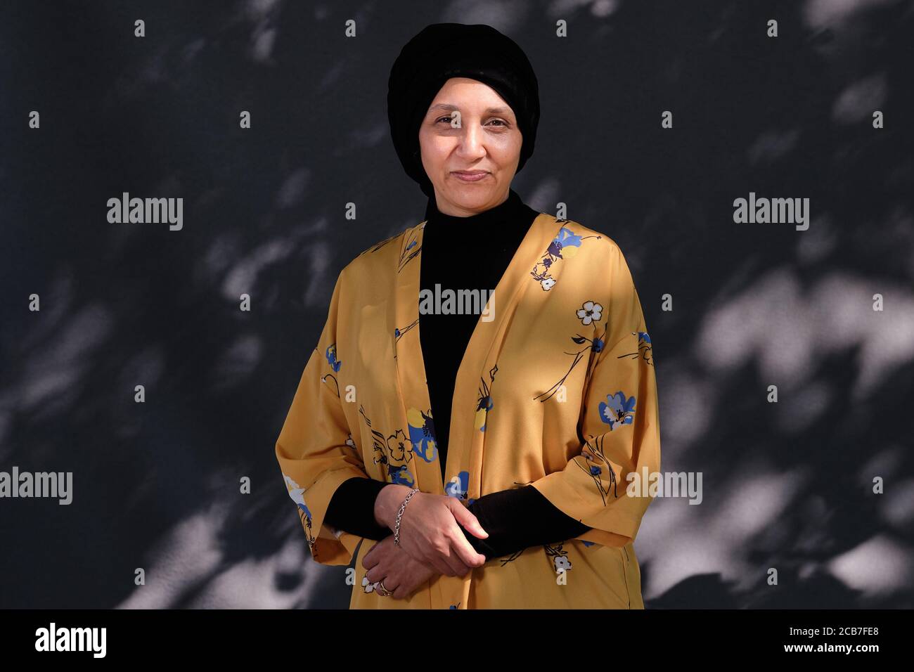 La scrittrice sudanese Leila Aboulela frequenta una fotocellula durante la città di Edimburgo Festival Internazionale del Libro 2018 Foto Stock
