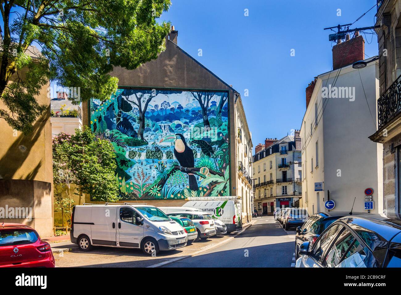 "Toucans à bec caréné" murale d'arte di strada su tela (125 mq) di Alain Thomas - Rue Fanny Peccot, Nantes, Loire-Atlantique, Francia. Foto Stock