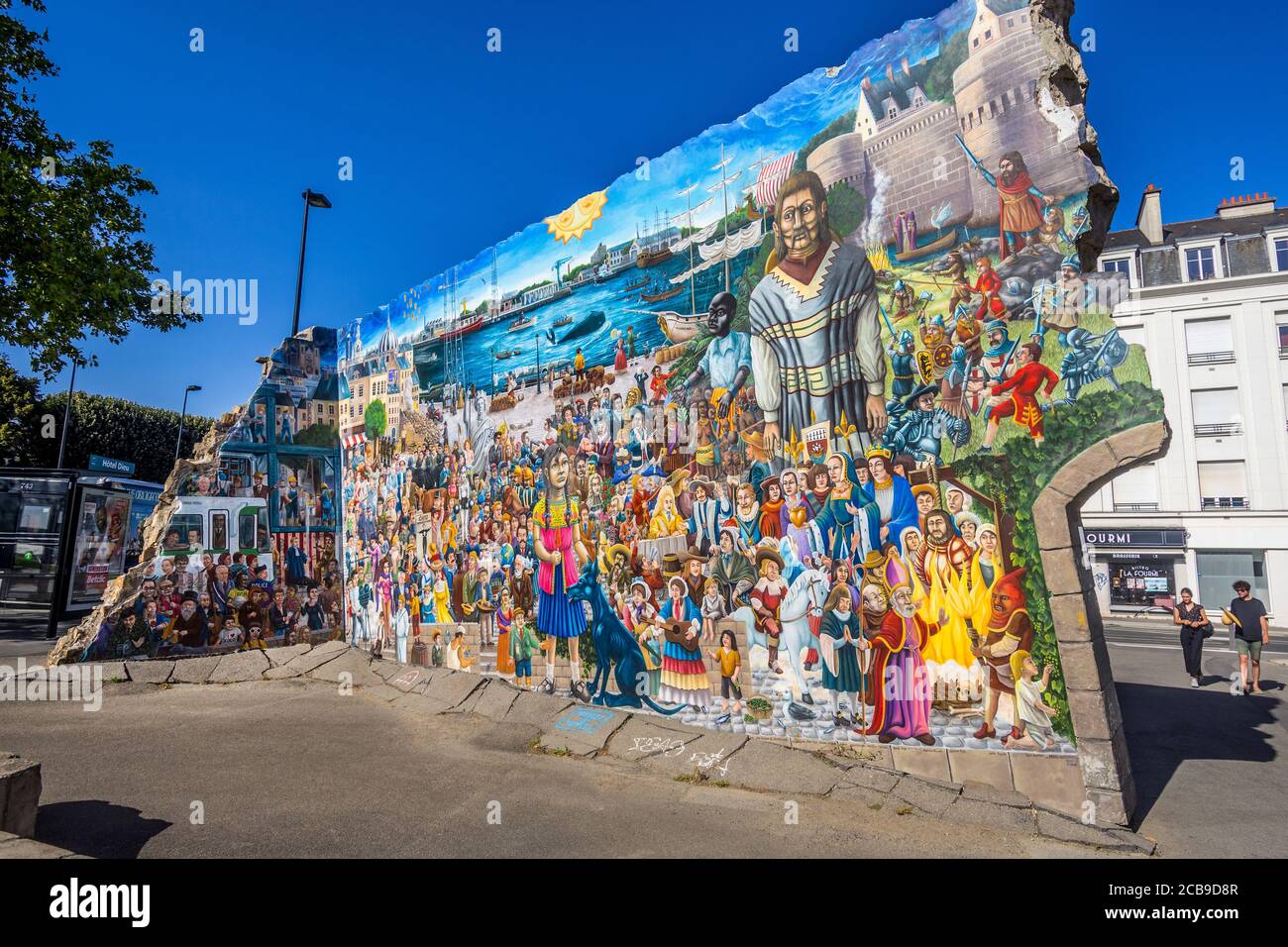 "La Fresque des Géants" murale d'arte di strada a Nantes, Loire-Atlantique, Francia. Foto Stock