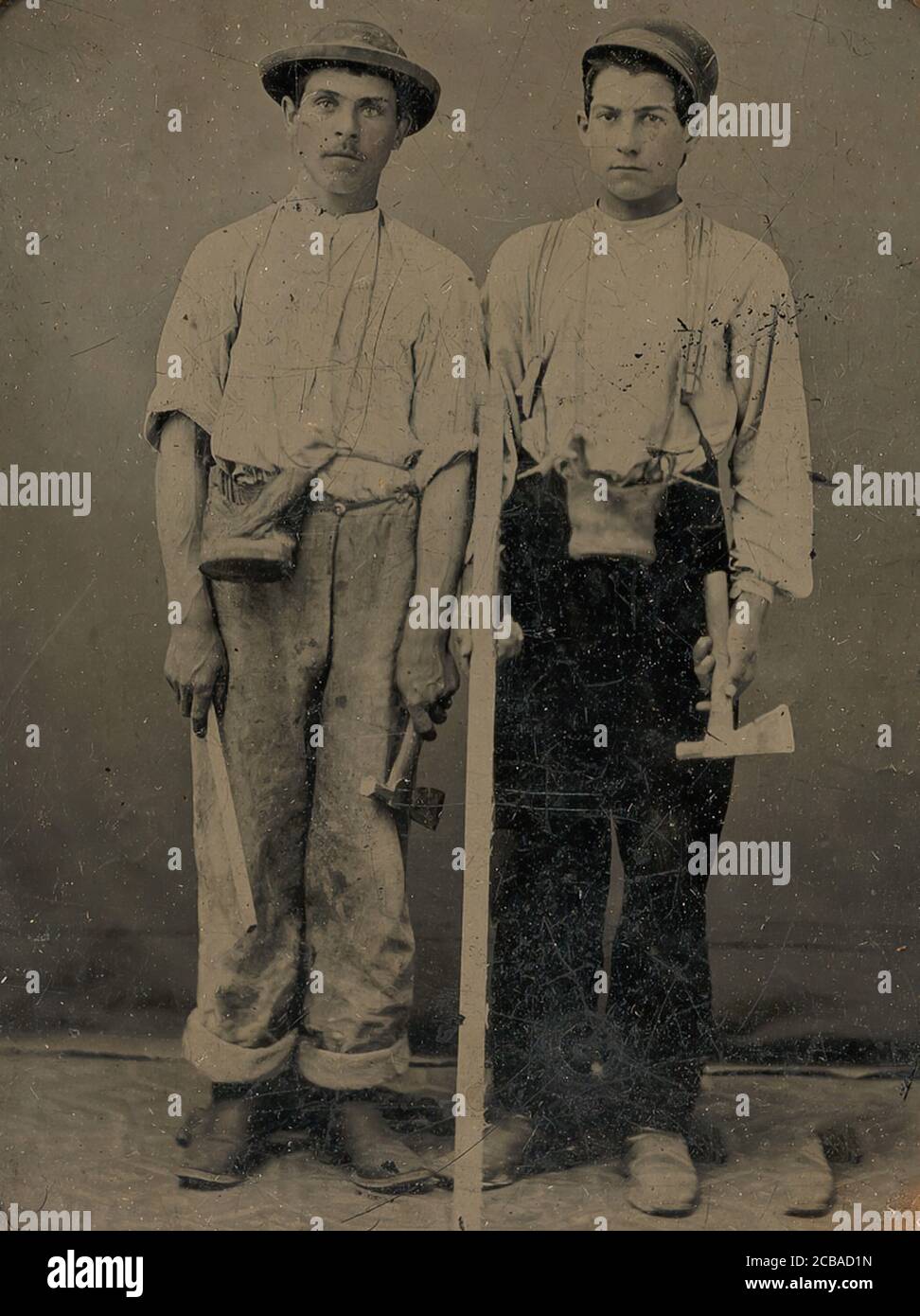 Due giovani operai con cazzi, 1860-70. Foto Stock