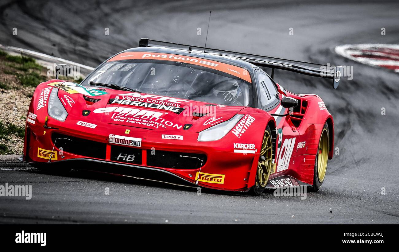 Oschersleben, Deutschland, 26 aprile 2019: Pilota tedesco Sebastian Asch alla guida di una Ferrari 488 GT3 durante la gara di auto GT MASTER alla Motorsport Arena Foto Stock