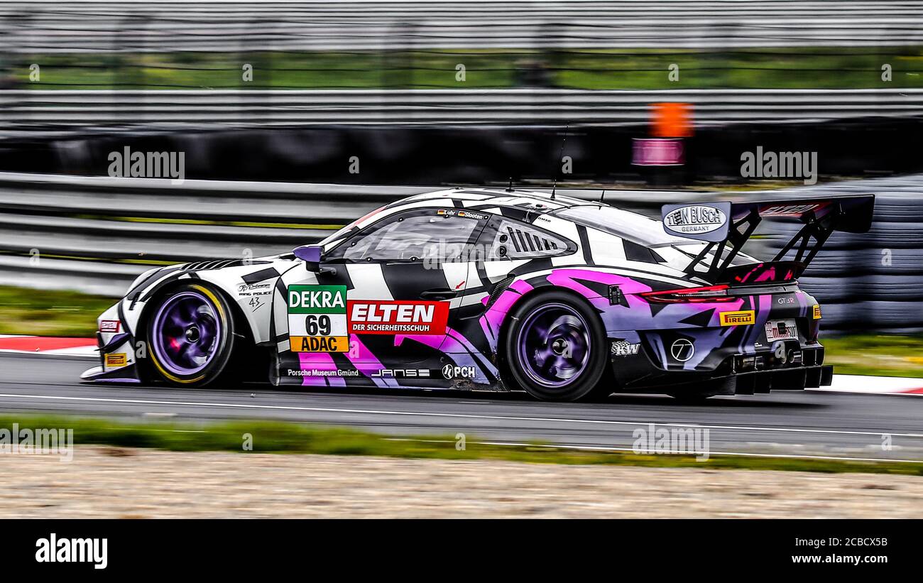 Oschersleben, Deutschland, 28 aprile 2019: Jan Erik Slooten guida una Porsche 911 durante una gara di auto GT MASTER alla Motorsport Arena di Oschersleben. Foto Stock