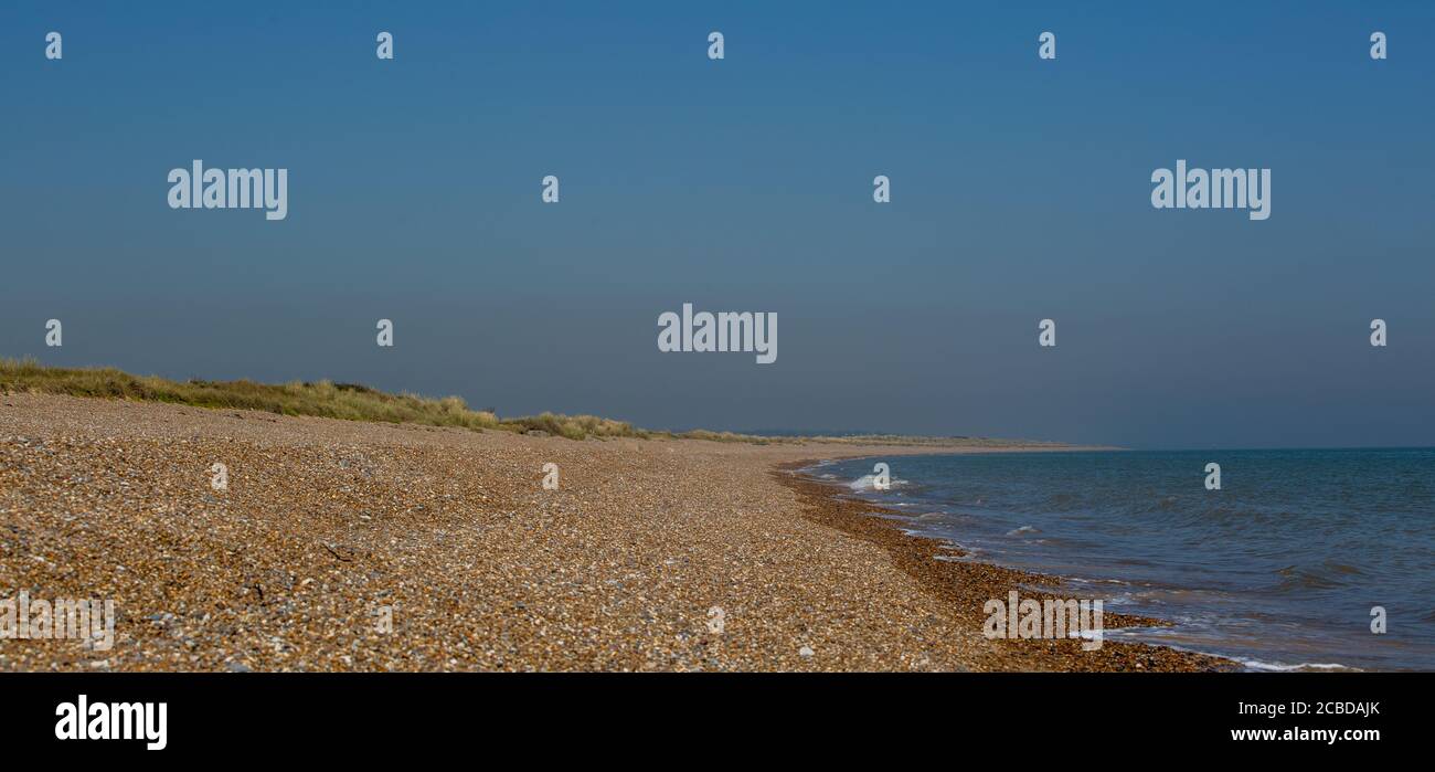 Una giornata estiva a Dunwich Beach Foto Stock