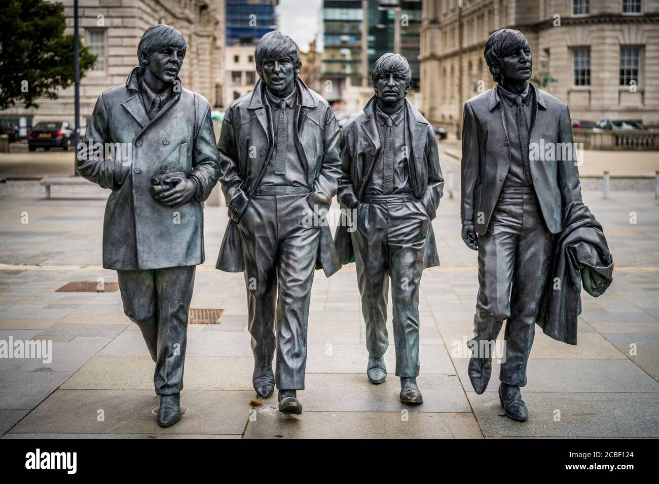 La statua dei Beatles Liverpool - statue a grandezza naturale dei Fab Four sul lungomare di Liverpool a Pier Head, lo scultore Andrew Edwards eretto nel 2015. Foto Stock