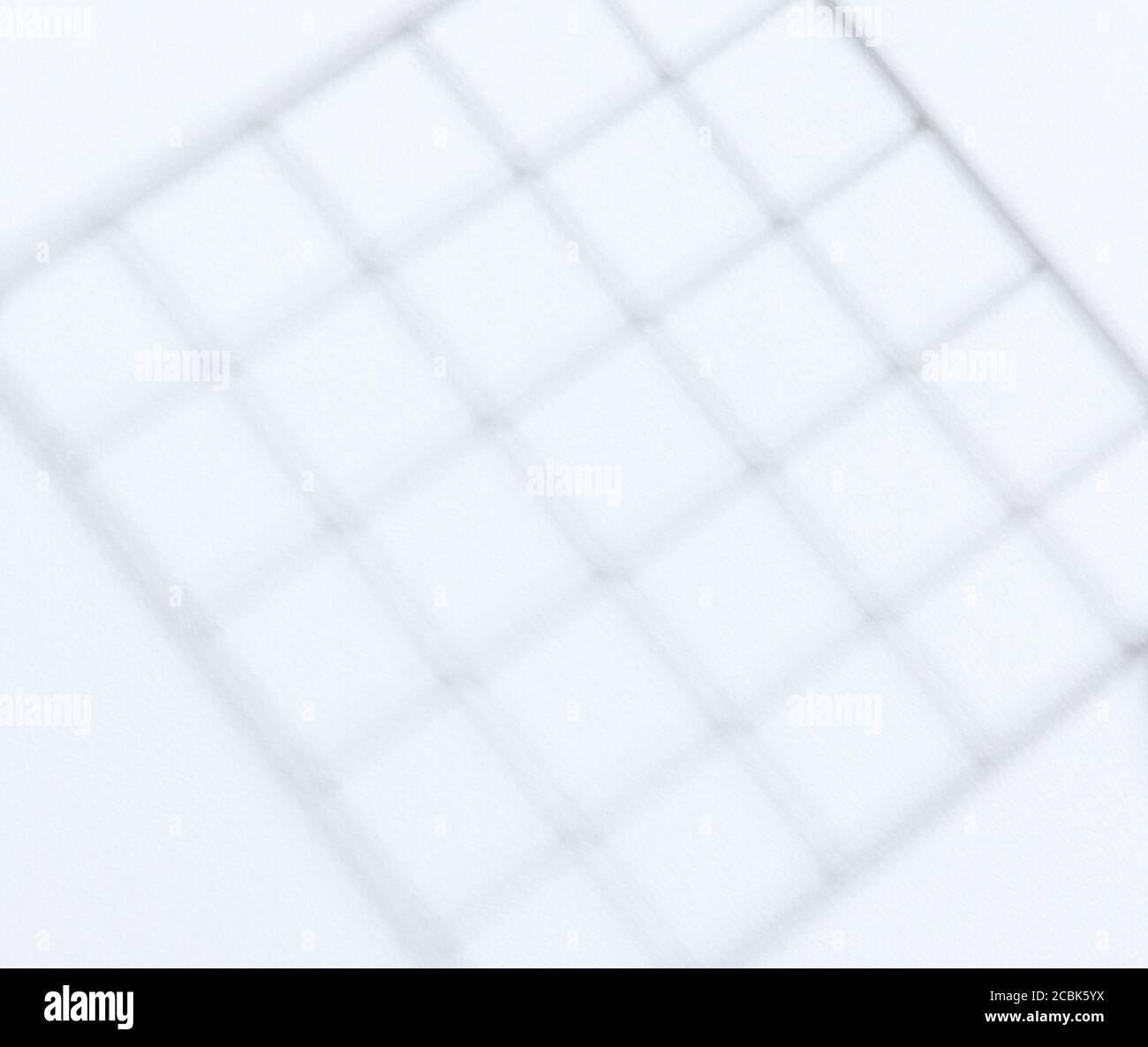 Ombra di cellule quadrate su sfondo bianco Foto Stock
