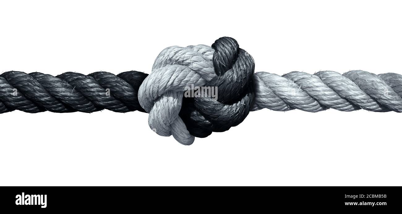 Concetto di fiducia e simbolo connesso come due corde diverse legate e collegate insieme come una catena indistruttibile come metafora di fede per la dipendenza. Foto Stock