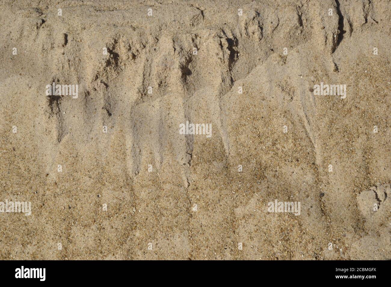 Sabbia di un edificio fotografato per scopi di sfondo, sabbia utilizzata nella costruzione di case e pareti Foto Stock