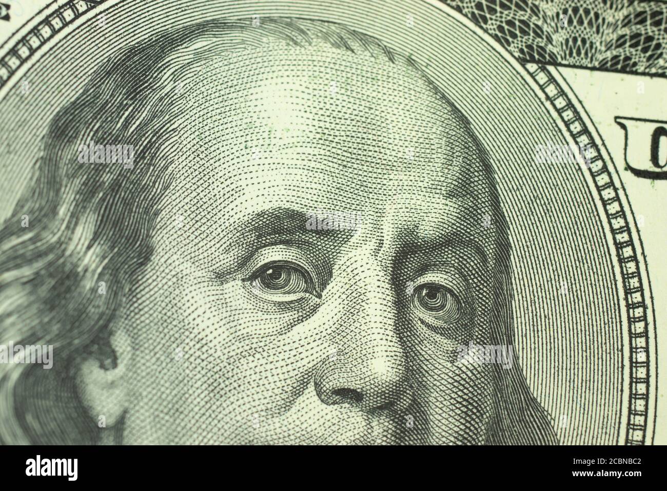Foto macro di Franklin in primo piano di una banconota da cento dollari Foto Stock