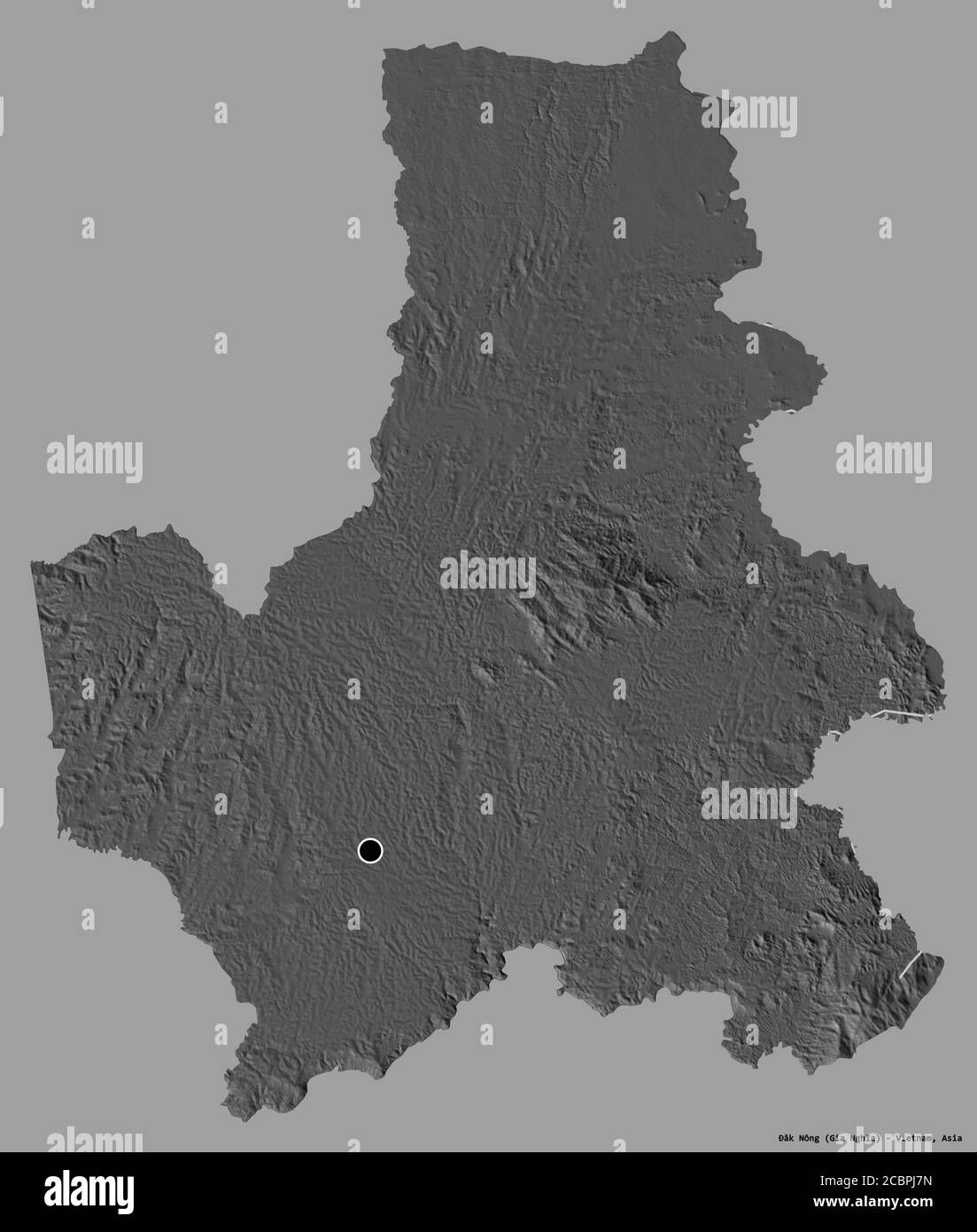 Forma di Đăk Nông, provincia del Vietnam, con la sua capitale isolata su uno sfondo di colore pieno. Mappa elevazione bilivello. Rendering 3D Foto Stock