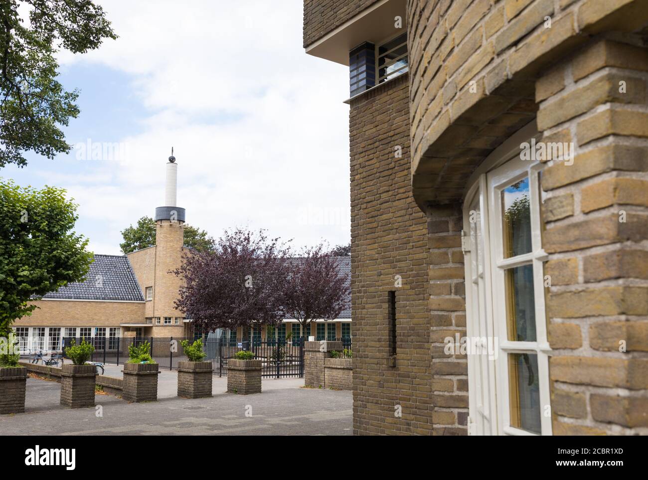 Architettura olandese di una scuola di Hilversum dell'architetto Dudok, scuola di Fabritius Foto Stock