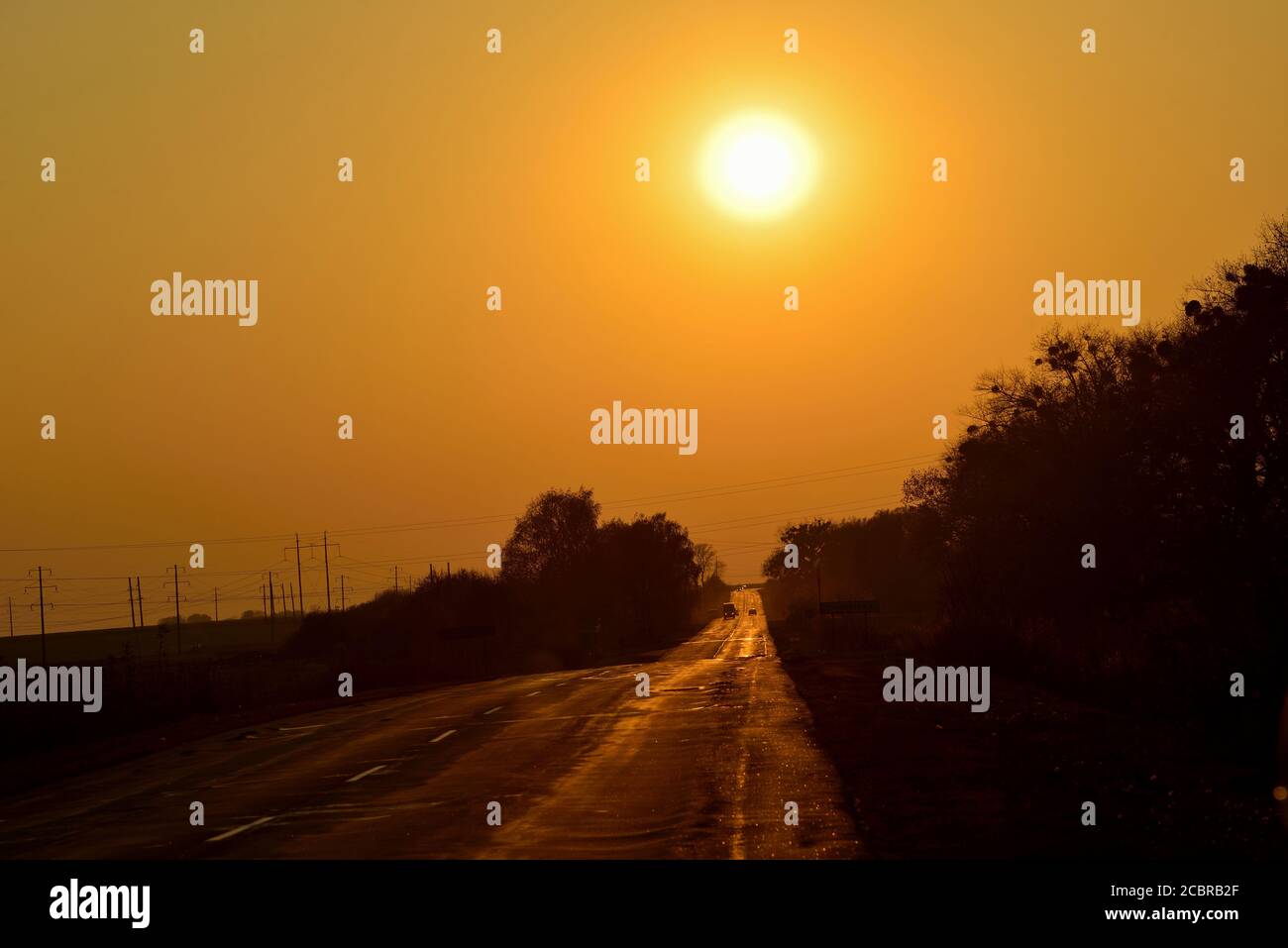 Vista sulla strada del tramonto Foto Stock