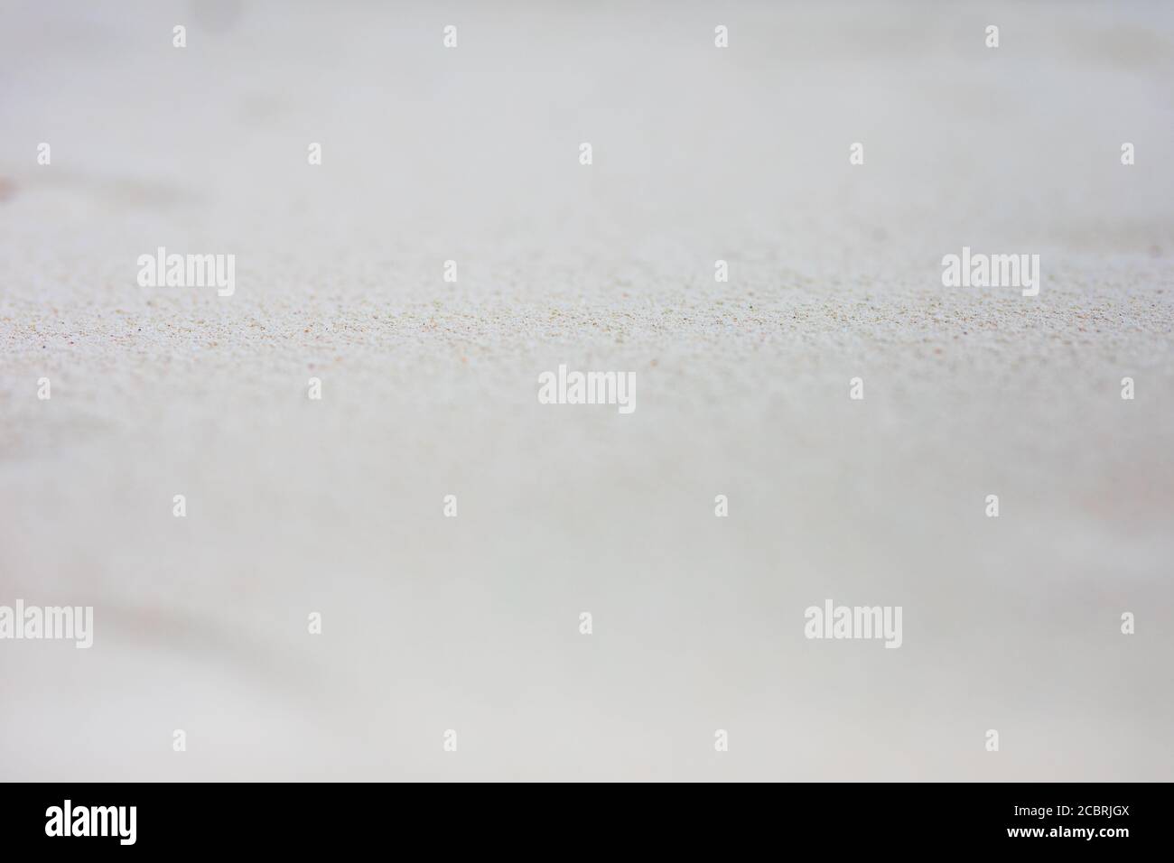 Sabbia tessitura, primo piano di una certa sabbia sulla riva. Foto macro di Foto Stock