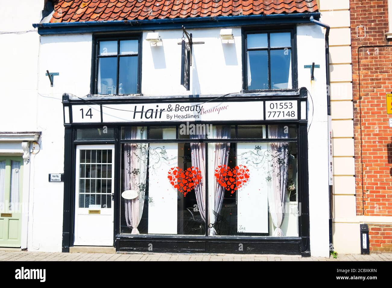 Parrucchieri locali su Kings Lynn. Foto Stock