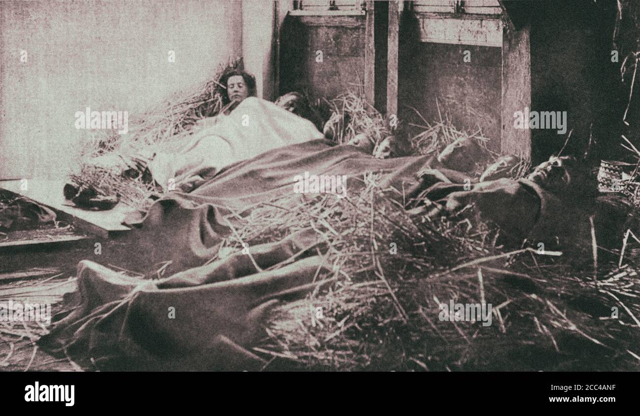 I rifugiati belgi dormono in un fienile in Francia la vigilia di Natale. 1914. Foto Stock