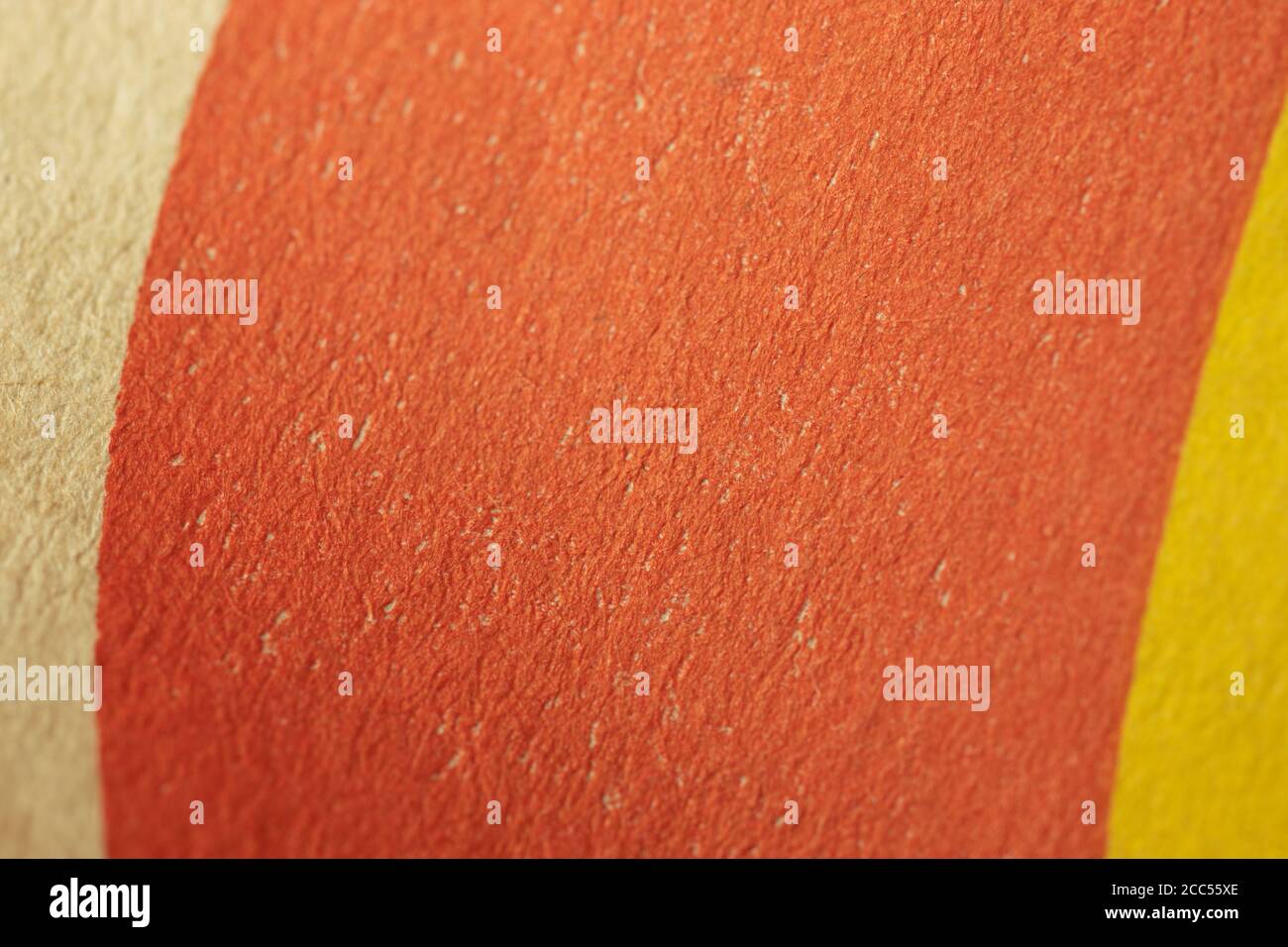 Sfondo a trama di carta di colore rosso, marrone e giallo Foto Stock