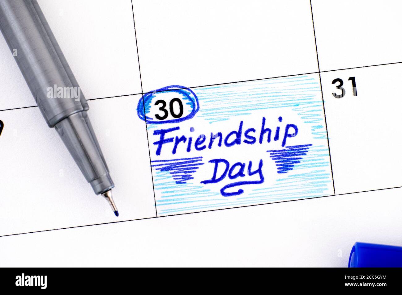 Promemoria Friendship giorno in calendario con penna. Luglio 30. Foto Stock