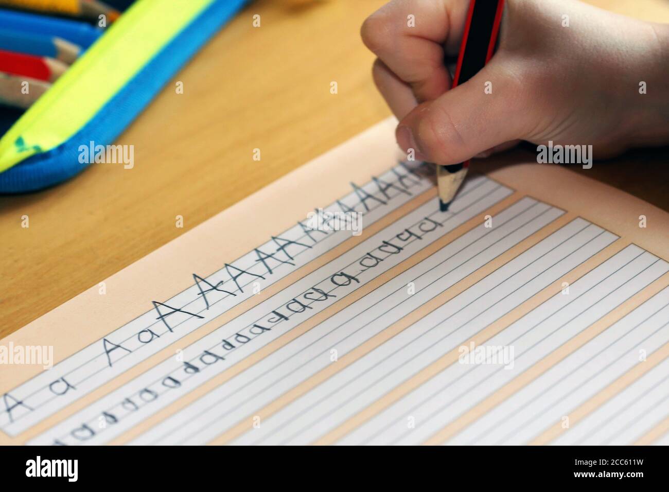 Immagine del simbolo: Il primo livellatore apprende la scrittura Foto Stock