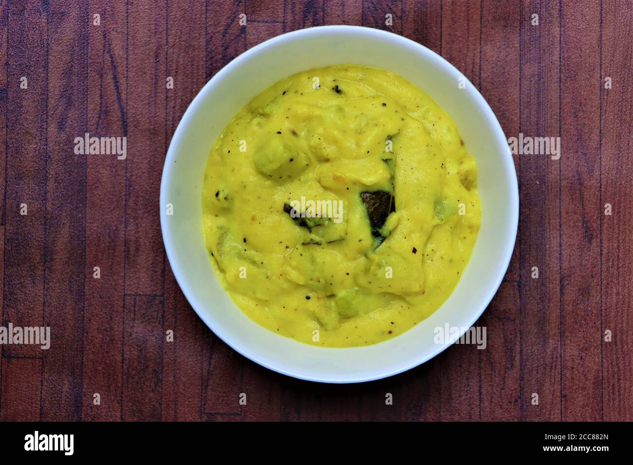 Majjige huli è un alimento dell'India del sud preparato con la cagliata del latte, tipicamente include le verdure in un sugo del latticello Foto Stock