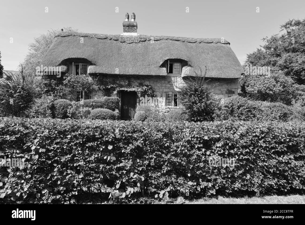 Cottage con tetto in paglia sull'Isola di Wight. Foto Stock