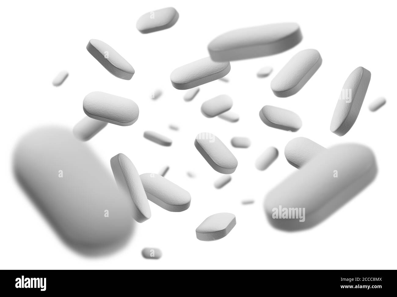 Le compresse bianche si levitano su sfondo bianco Foto Stock