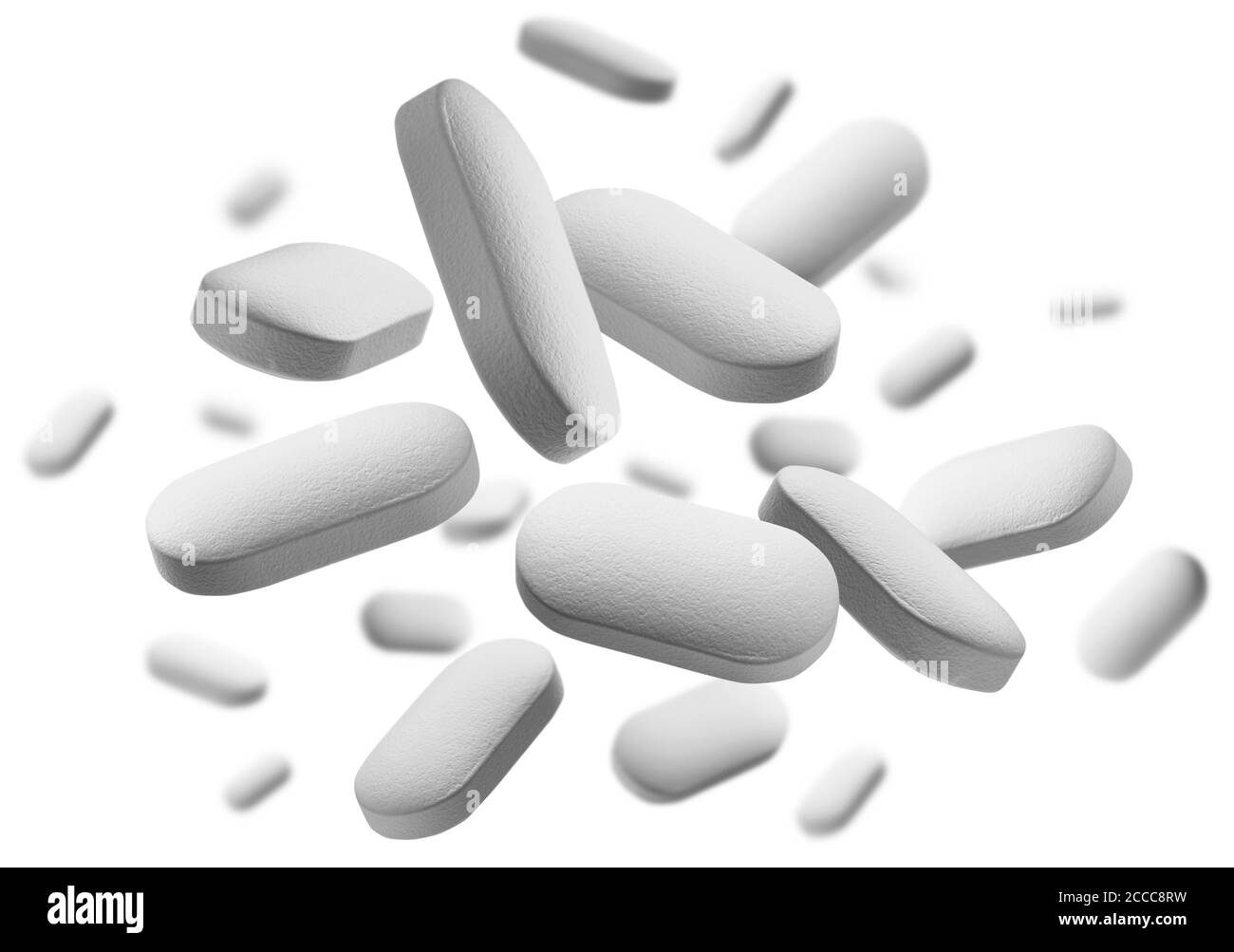 Le compresse bianche si levitano su sfondo bianco Foto Stock