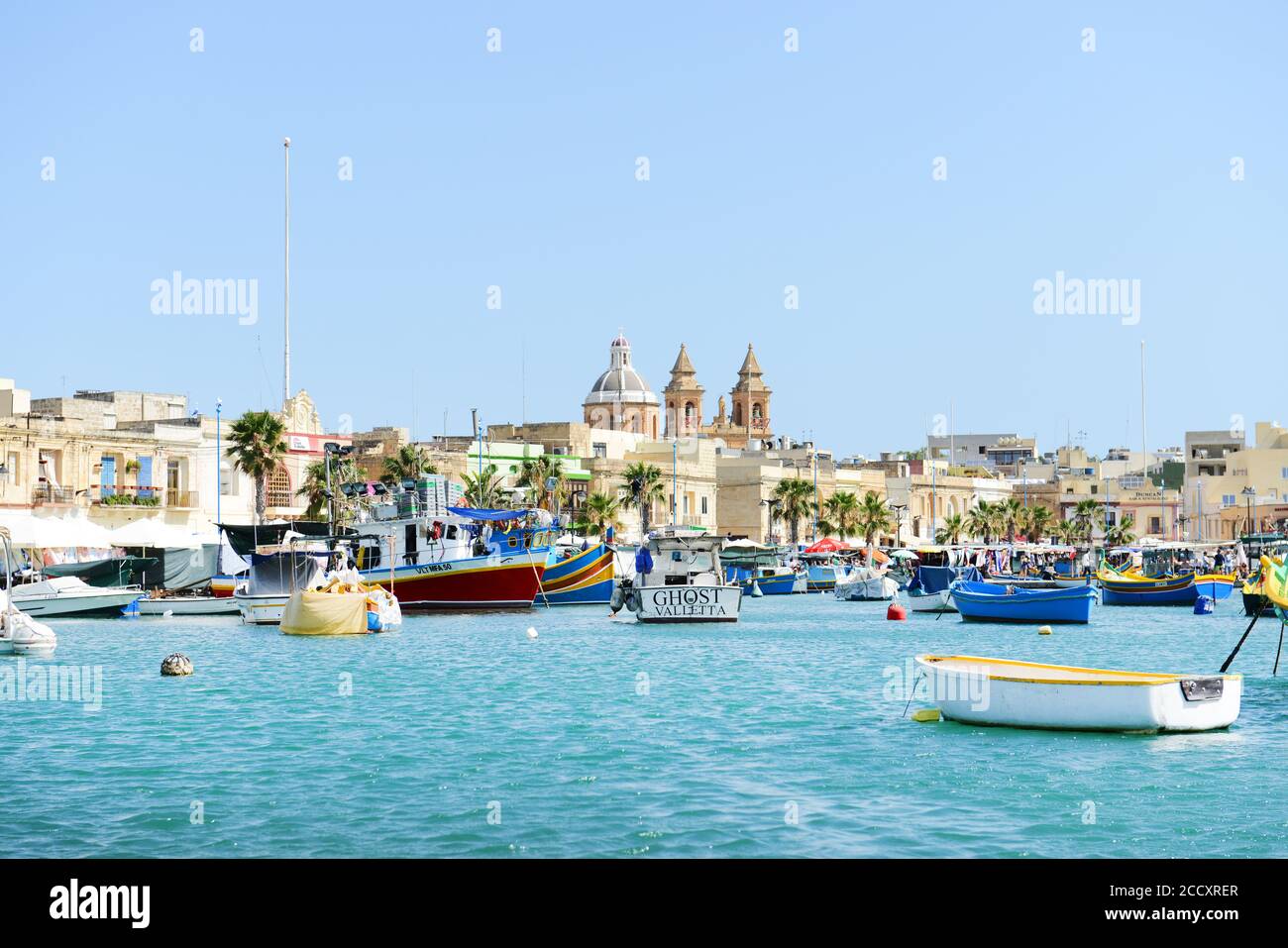 Barche da pesca maltesi al porto di Marsaxlokk, Malta. Foto Stock