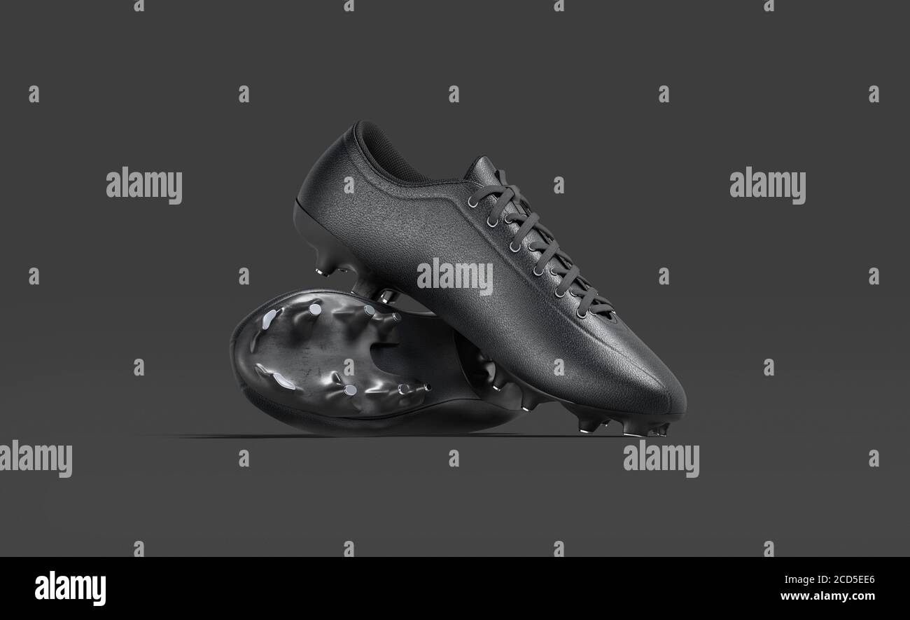 Stivali da calcio neri bianchi con scarpe da calcio in gomma mockup stack, oscurità Foto Stock Stivali da calcio neri bianchi con scarpe da calcio in gomma mockup stack, oscurità Foto Stock