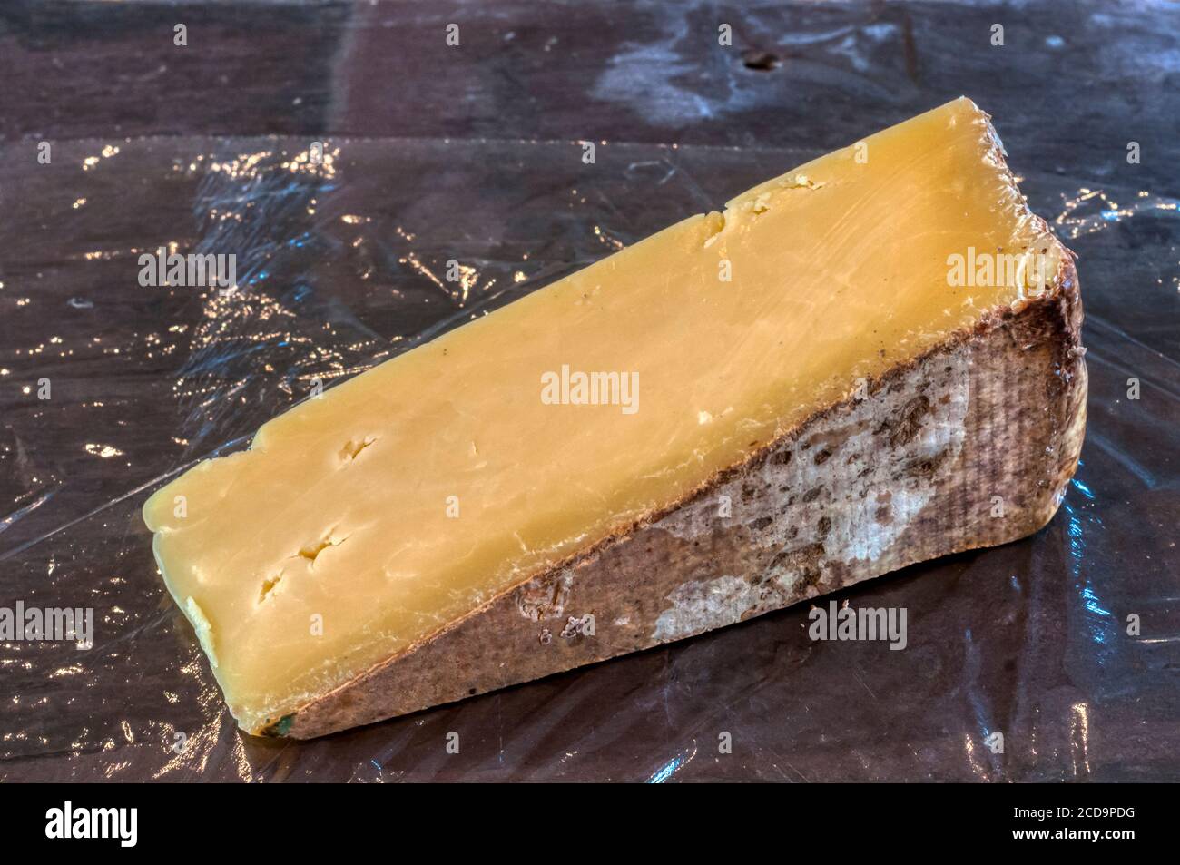 Formaggio Lincolnshire Poacher prodotto alla Ulceby Grange Farm, Alford nel Lincolnshire. Foto Stock