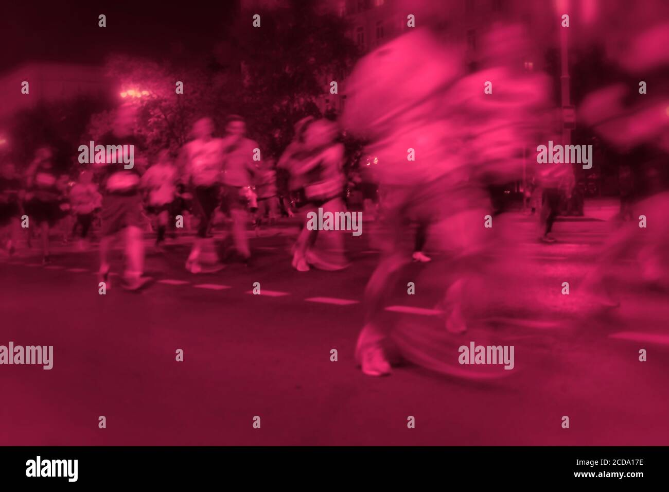Corridori maratona. Blurred Motion gruppo atleti, città strada. Astratto sfondo sportivo. Fitness e stile di vita sano, concetto di attività sportiva. Foto Stock