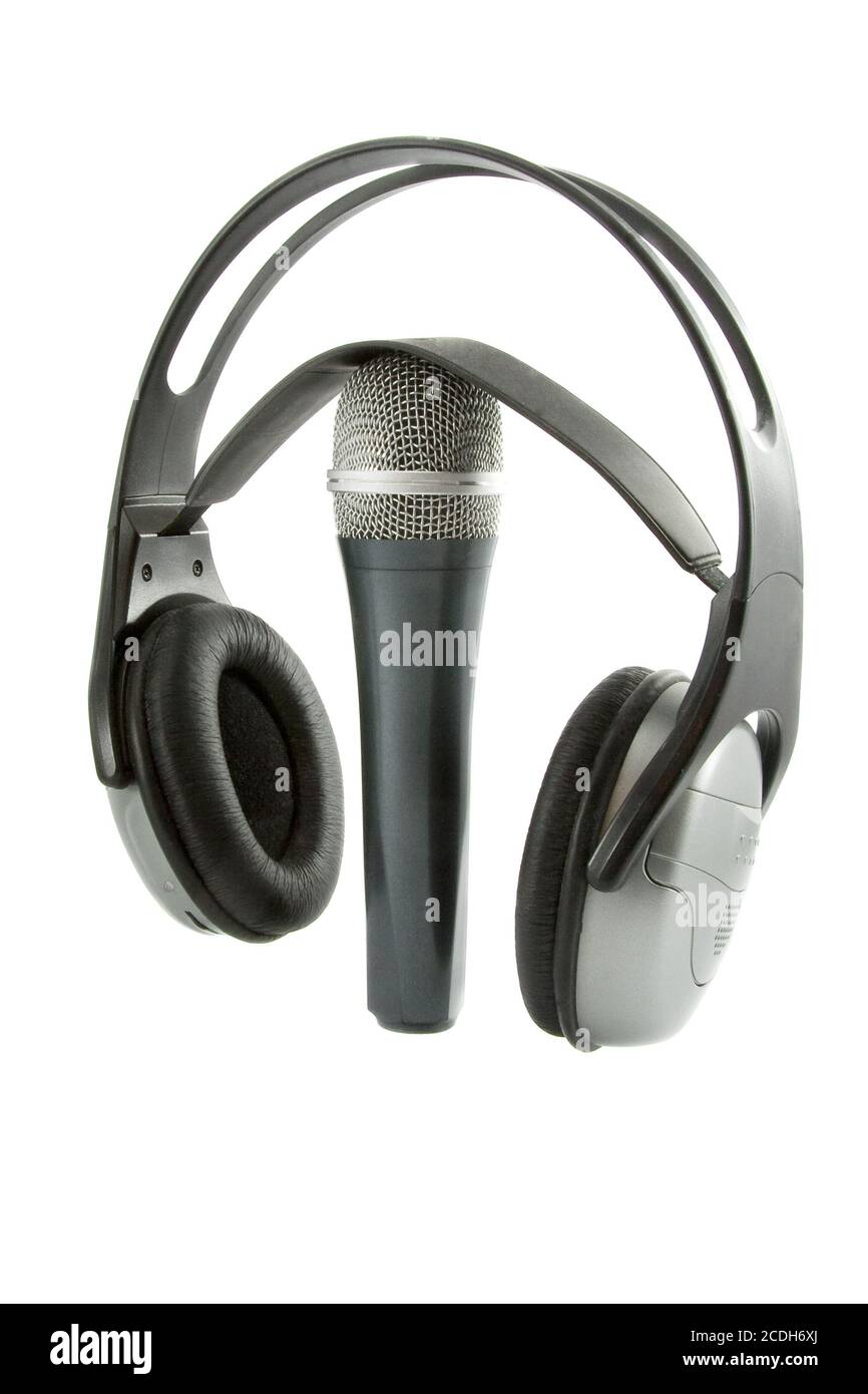In aria!!! Microfono DJ cuffie wireless su esso isolate su sfondo bianco Foto Stock