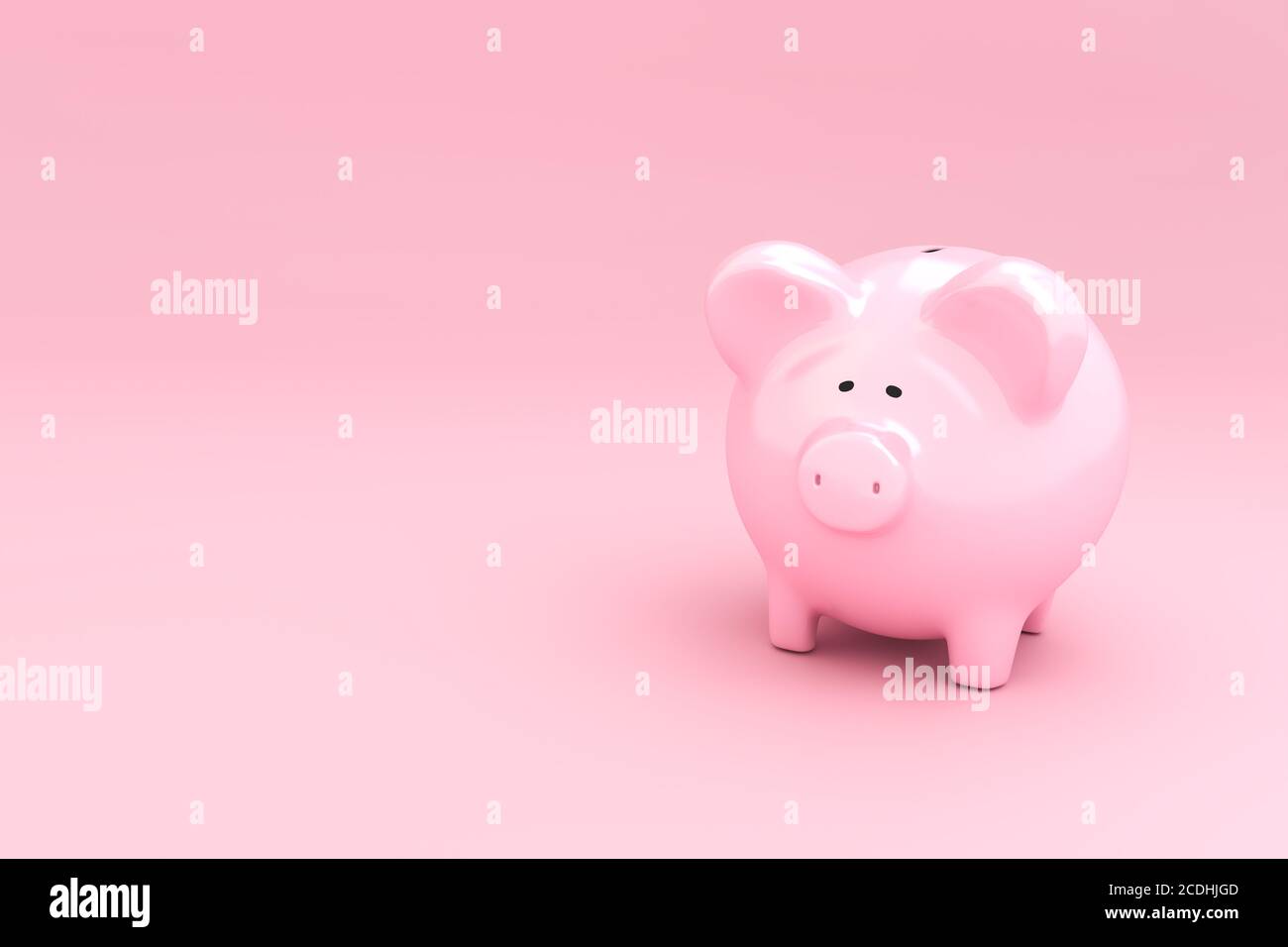 Concetto di risparmio Piggybank: Pink piggybank su sfondo rosa con copyspace Foto Stock