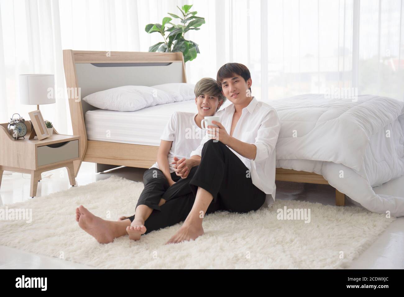 Coppie gay giovani ragazzi Asiatici uomini LGBT Concepts. Foto Stock