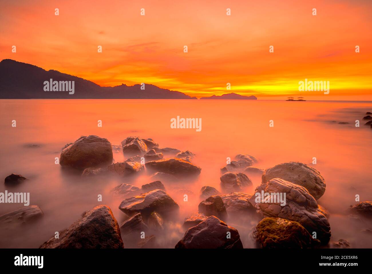 Formazioni rocciose a lunga esposizione al tramonto Foto Stock