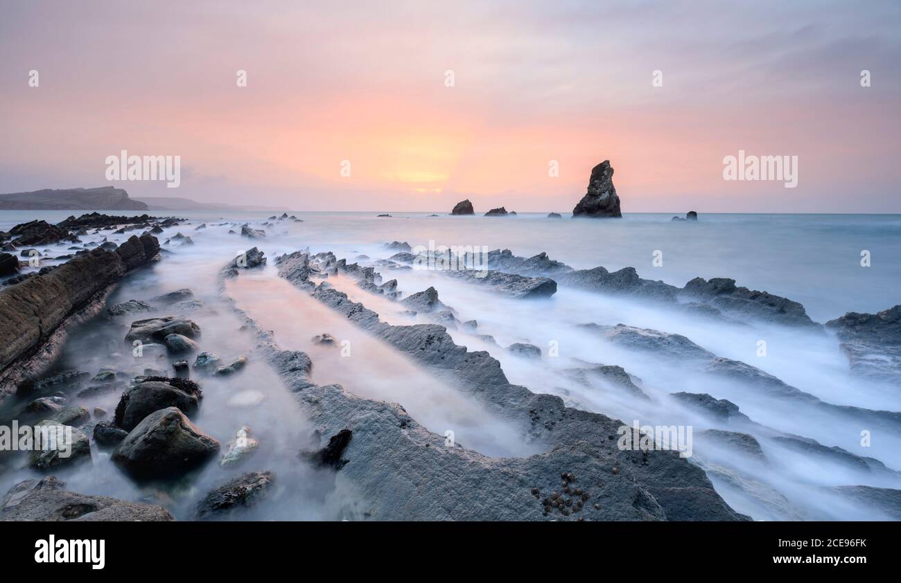 Alba invernale a Mupe Bay. Foto Stock