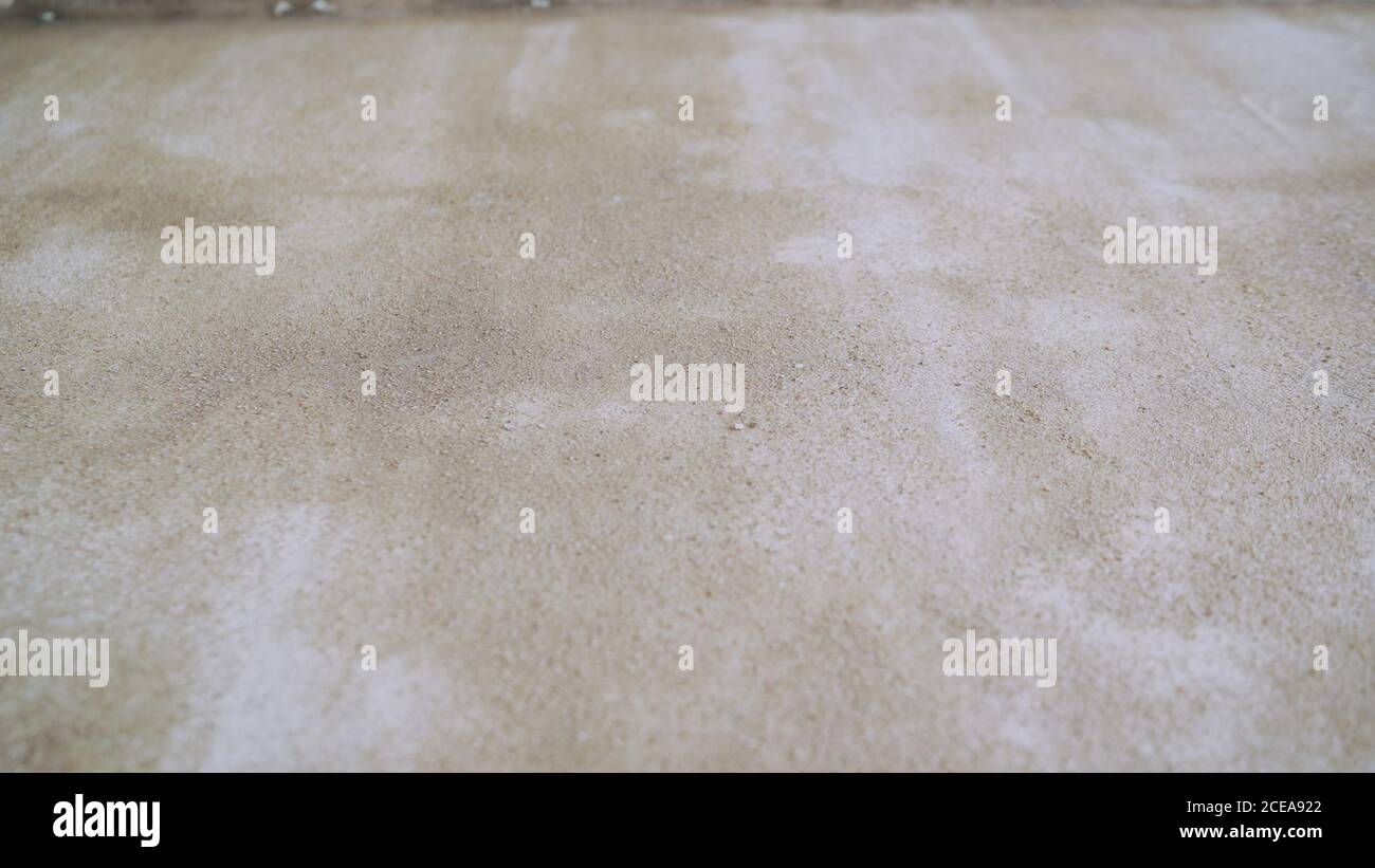 Pavimento in cemento armato. Il pavimento è verniciato, cemento bianco. Foto Stock