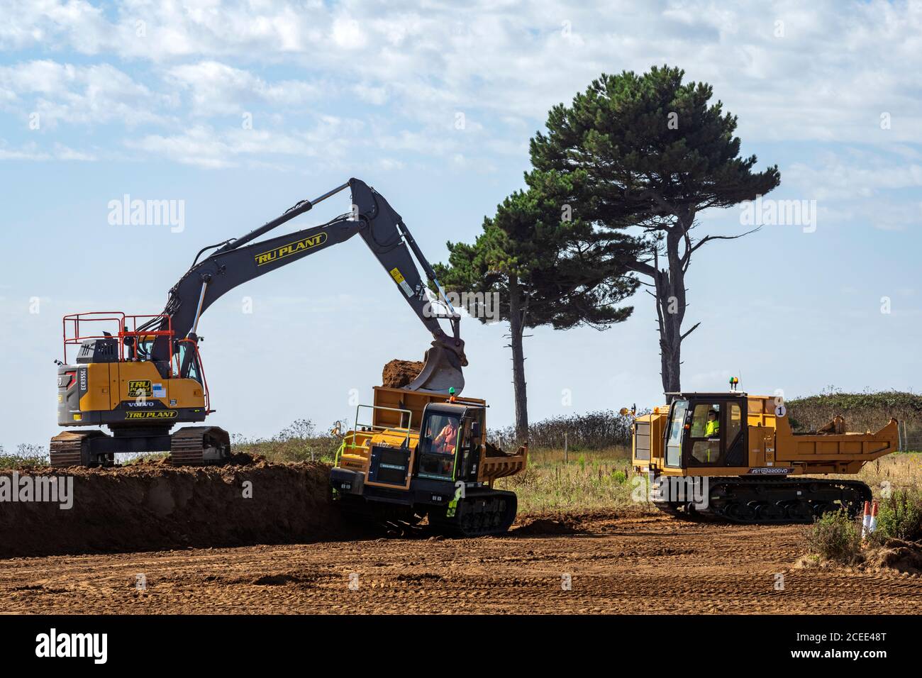 Lavori su cavi elettrici sotterranei per Scottish Power Renewables, Bawdsey, Suffolk, UK. Foto Stock Lavori su cavi elettrici sotterranei per Scottish Power Renewables, Bawdsey, Suffolk, UK. Foto Stock