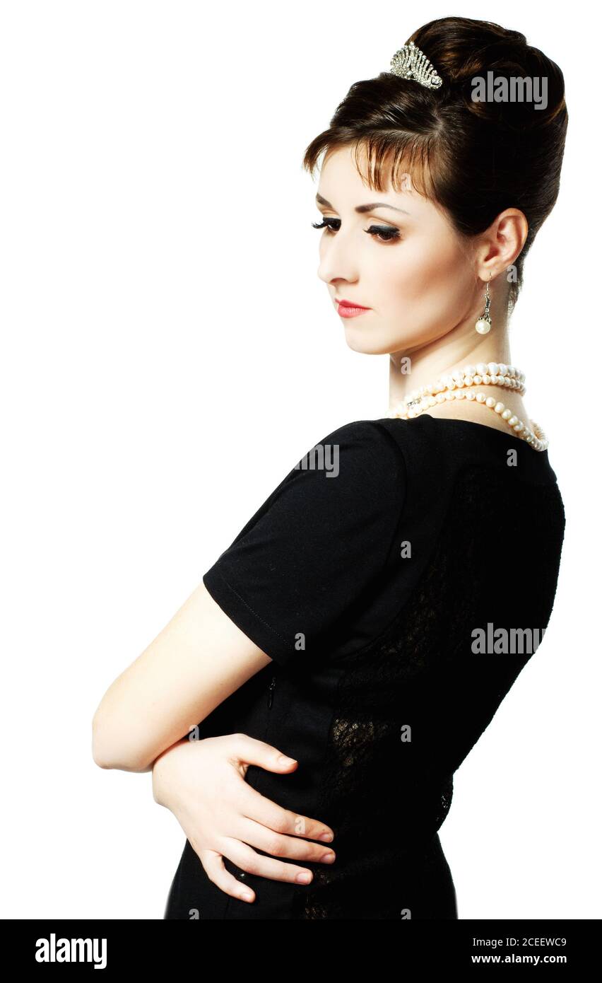 vintage Ritratto di una bella giovane ed elegante donna. La ragazza nell'immagine di Audrey Hepburn. Foto Stock