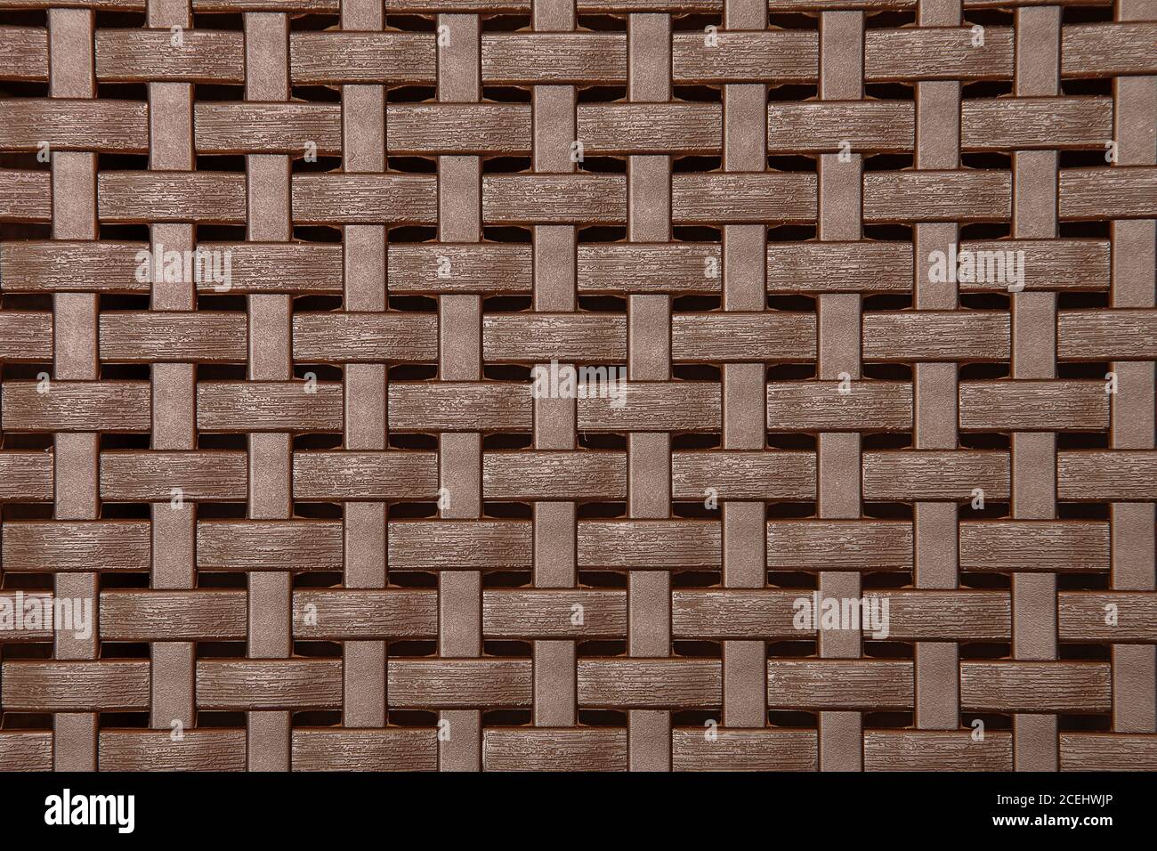Texture in vimini in plastica, motivo sfondo marrone con intemperie Foto Stock